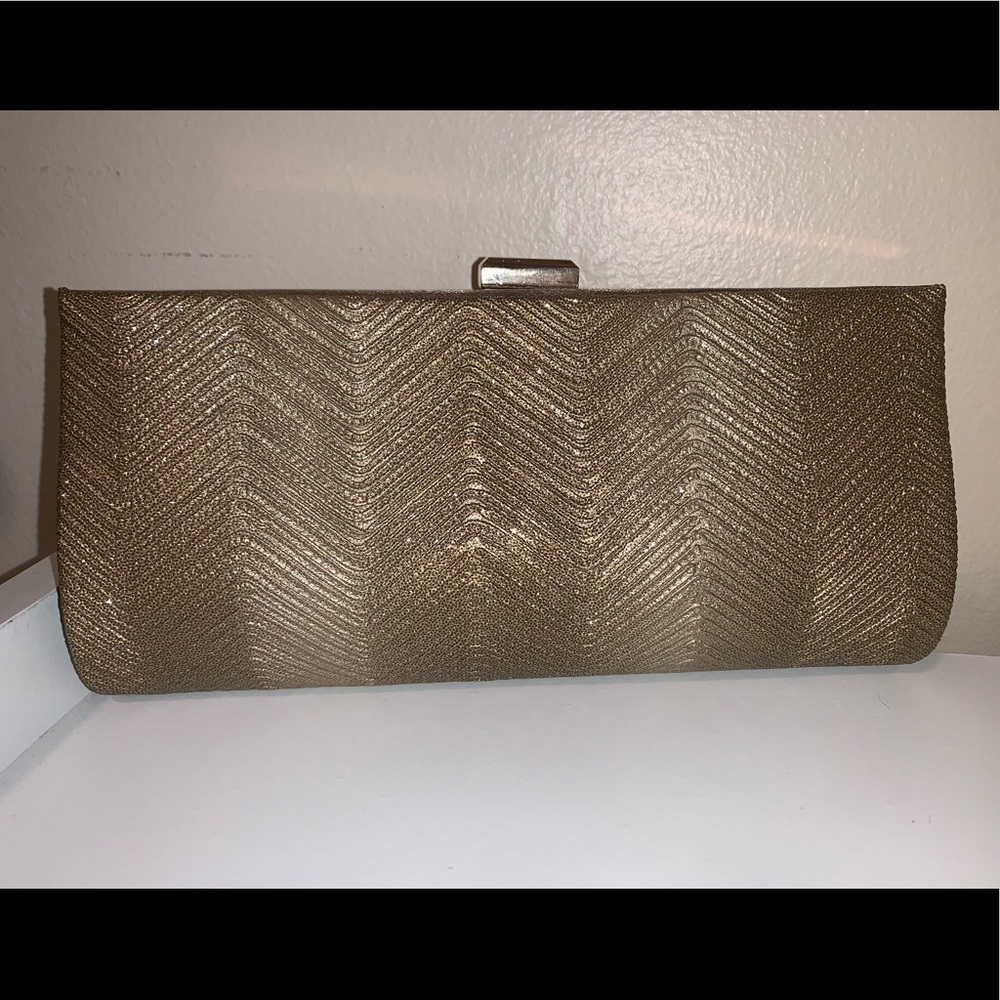 Sondra Roberts gold clutch
